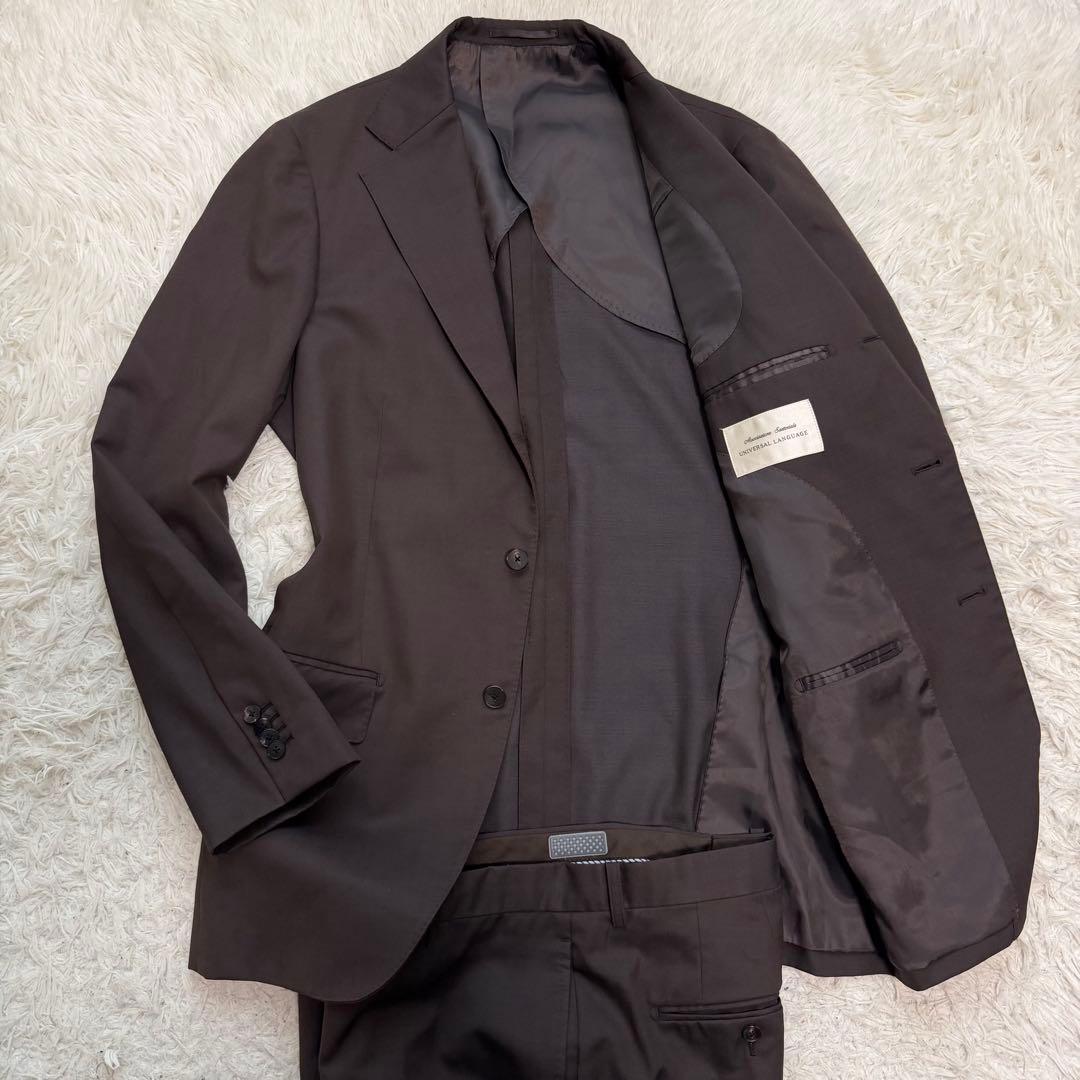 近年極美品XLサイズ相当　ユニバーサルランゲージ　sustaina スーツ
