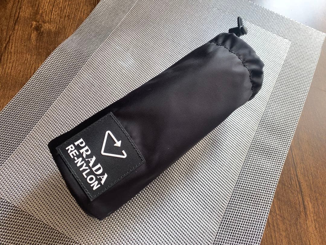 PRADA RE-NYLONボトルケース　。未使用保管品。