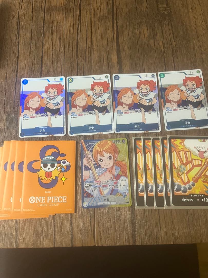 ワンピースカード　ナミ（リーダーパラレル）、少女（プロモ）おまけ付き
