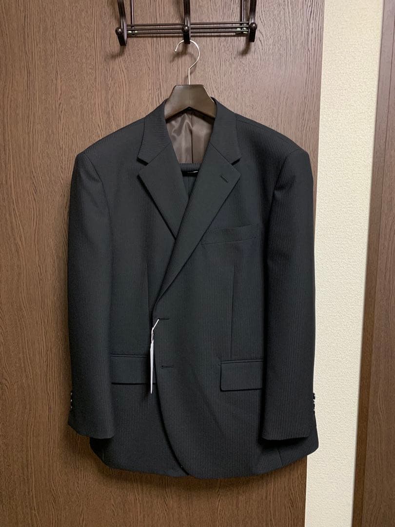 希少K5新品未使用！無地調ブラックシングルスーツ！経済的ウォッシャブル！年間定番