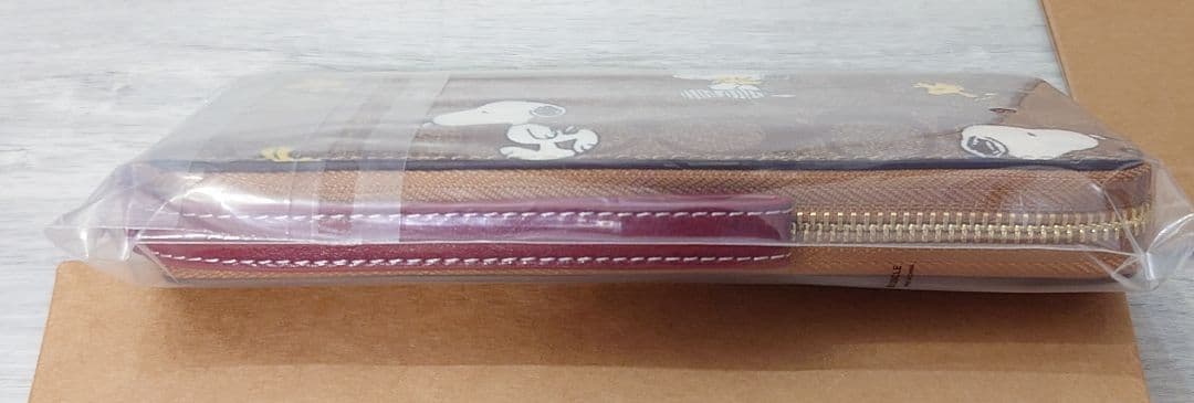 新品 COACH コーチ スヌーピー シグネチャー柄 ラウンドジップ 長財布