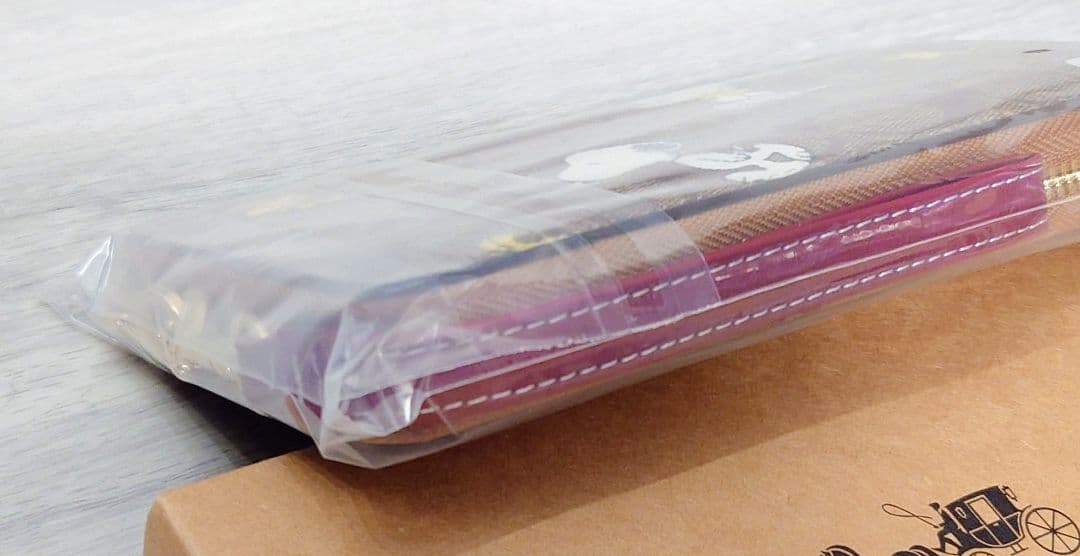 新品 COACH コーチ スヌーピー シグネチャー柄 ラウンドジップ 長財布