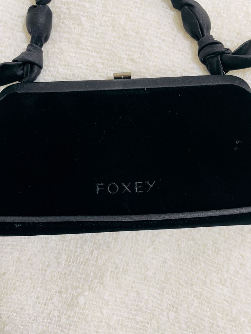 お値下げ。FOXEY ブラック クラッチバッグ