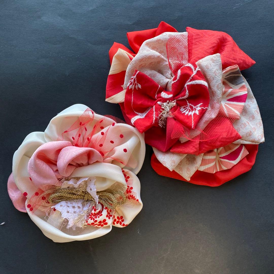 m.y 大きな赤いリボンのヘアアクセサリー とピンクの髪飾り