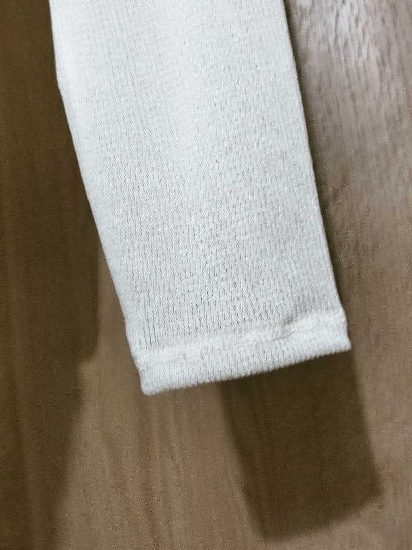 anuans バックオープンシアーカットトップス アイボリー