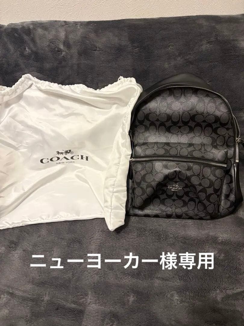 未使用・保存袋・説明書・ストラップ付き　COACH ブラック リュック