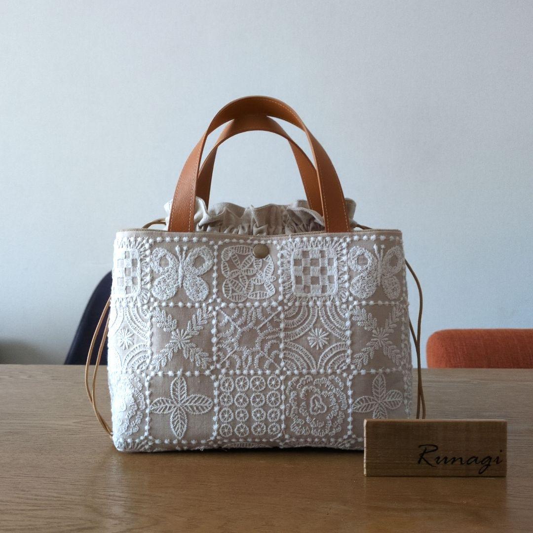 【1560】あおりポケットの巾着バッグ＊ミナペルホネン