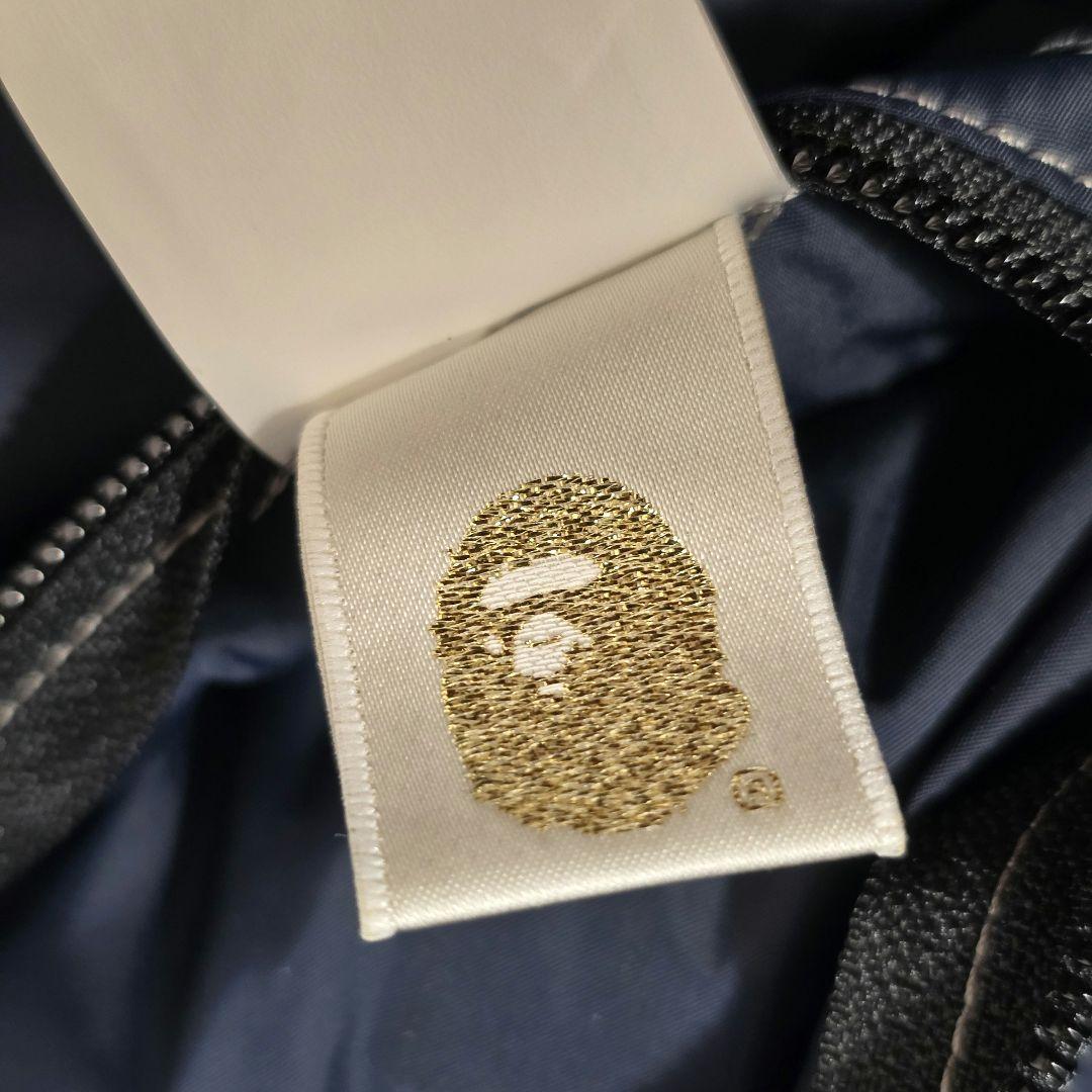 ロッキーマウンテンフェザーベッド × エイプ ダウンベスト ウール 42