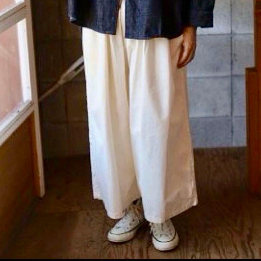 ゴーシュ 黒のウールジャケット、高城染工 生成りパンツ