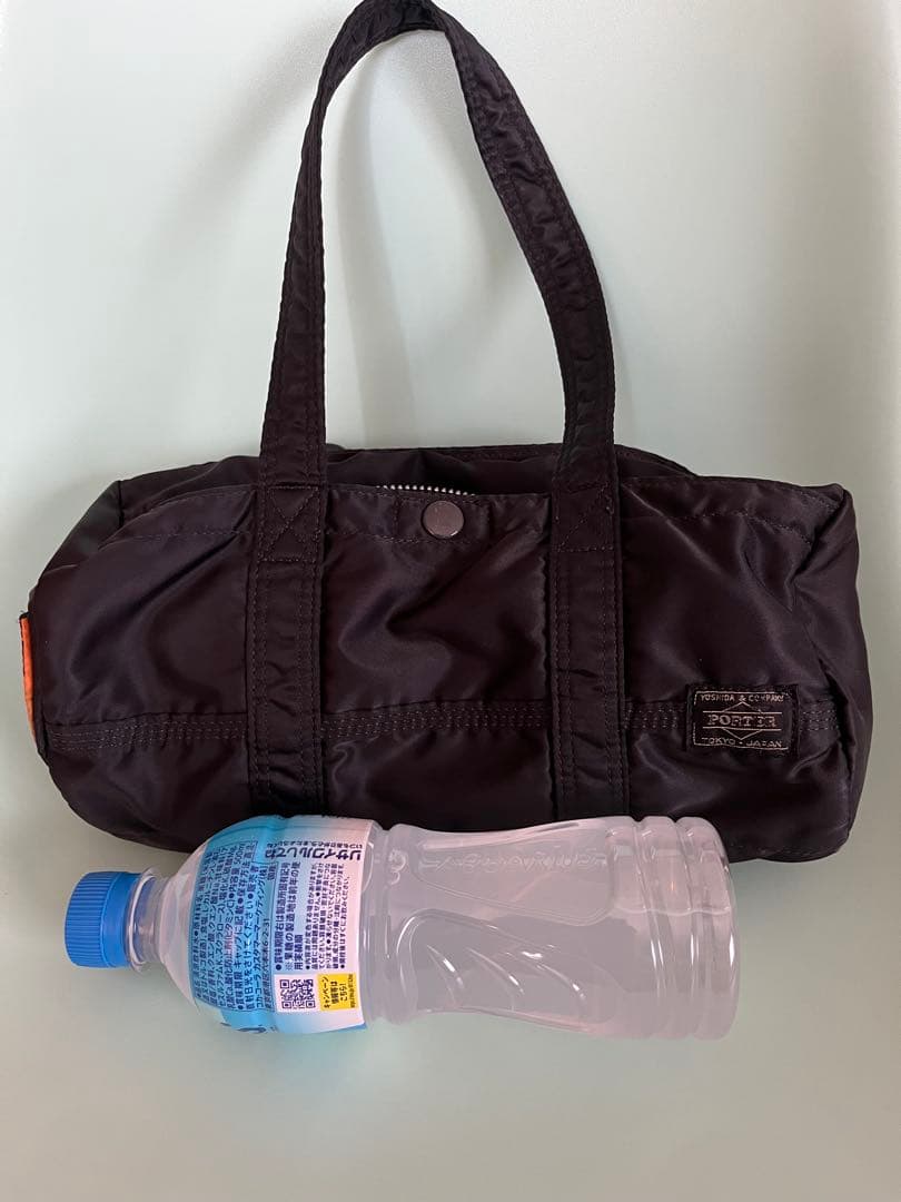 黒のドラムバッグ オレンジ内装