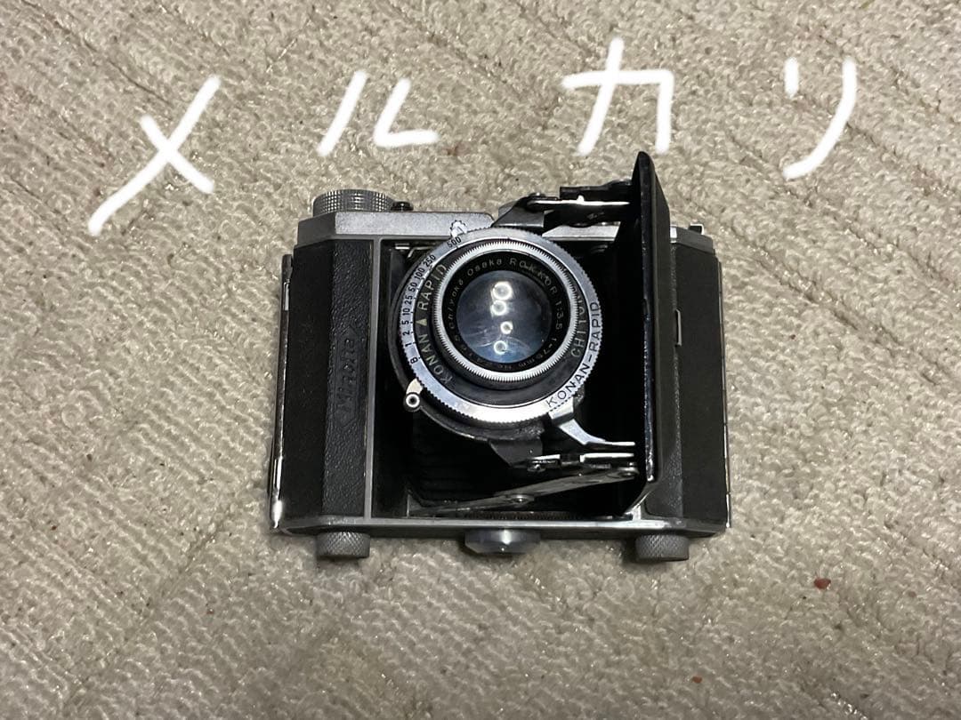 ミノルタ・蛇腹式カメラ、型式不明　年代不明？【蛇腹破れ無しだが、表面ヒビ有り】。