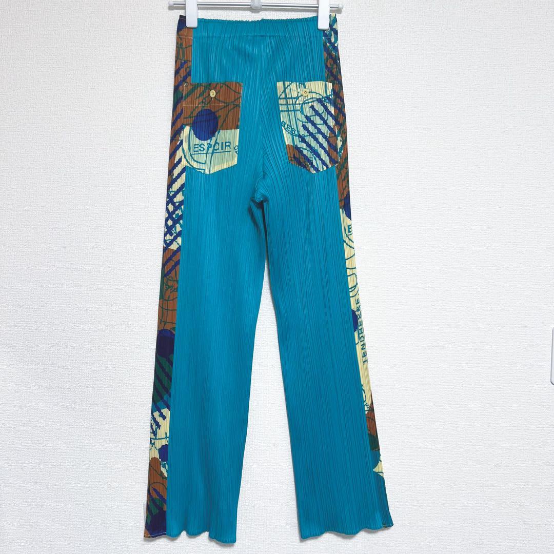 プリーツプリーズ サイドライン　パンツ　柄付き　裾フレア　ポケット　幾何学