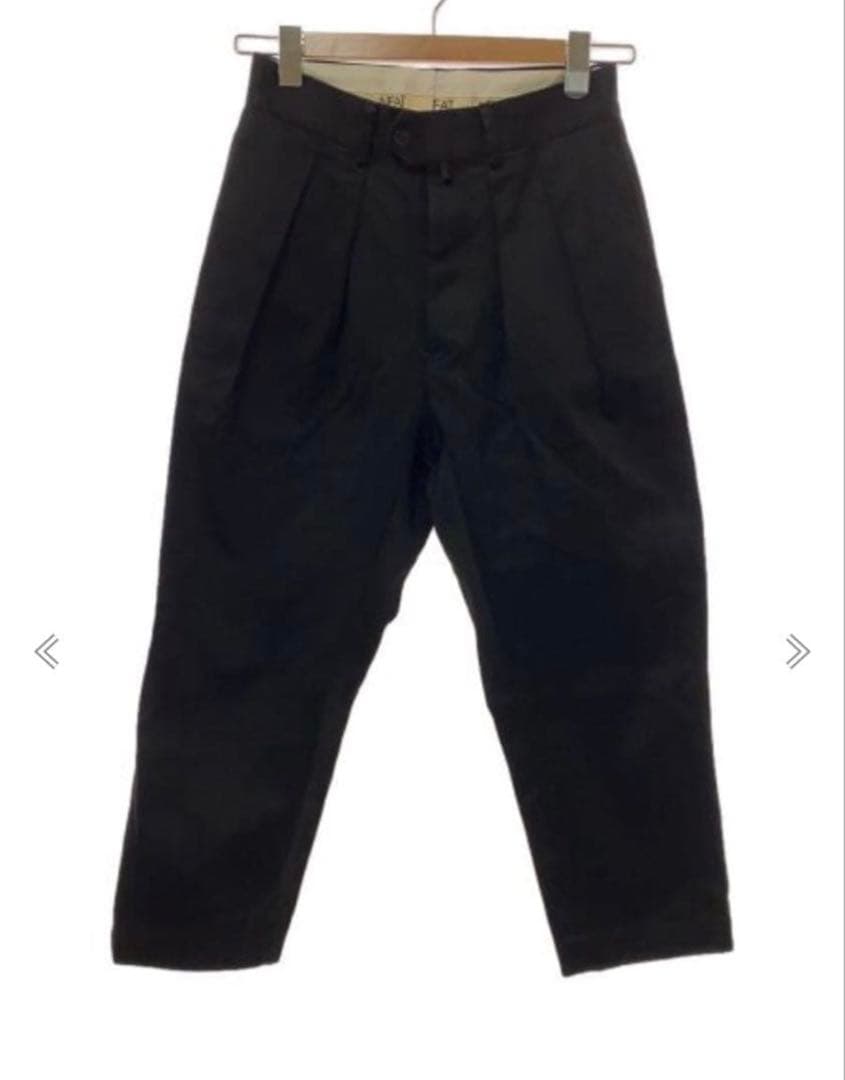 NEAT ブラック テーパードスラックス