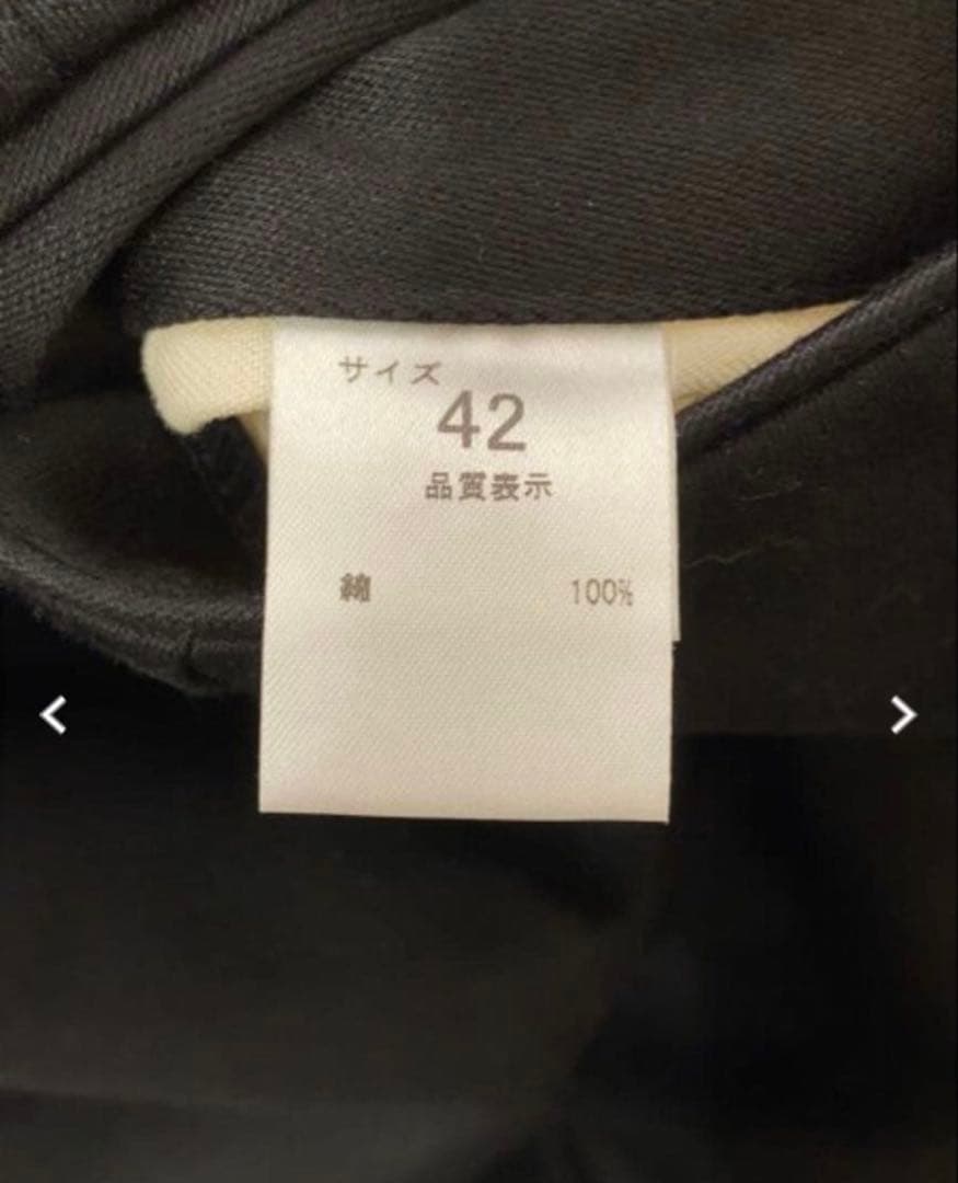 NEAT ブラック テーパードスラックス