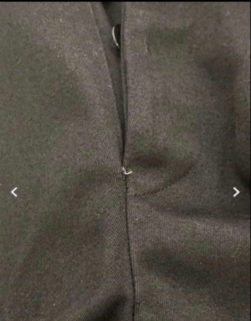 NEAT ブラック テーパードスラックス