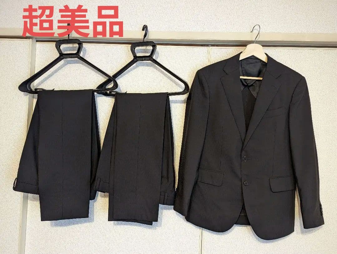 【新品未使用】ヒルトン　スーツセット(ブラック、165センチ標準体型)