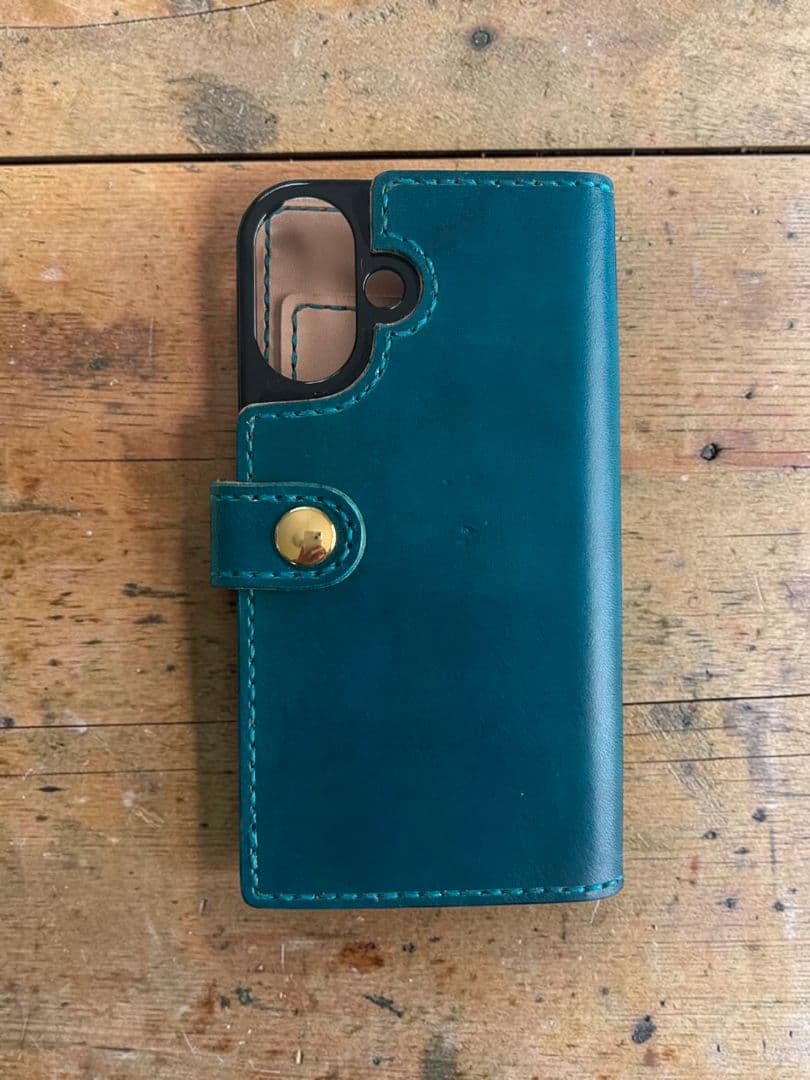 iPhone16用 手帳型ケース　 レザーカービング　オーシャンブルー