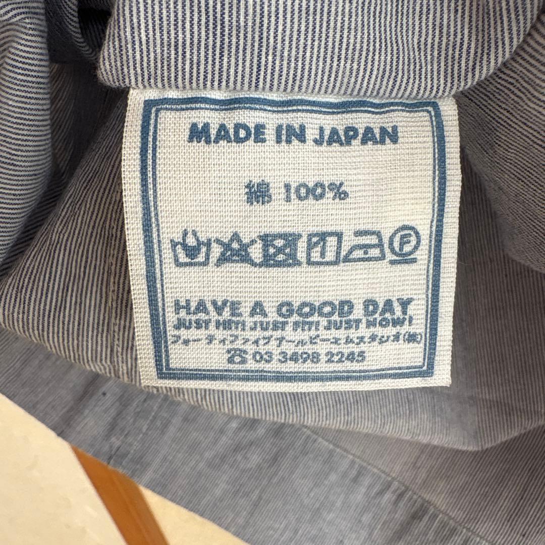 コットン混紡の青系長袖シャツ