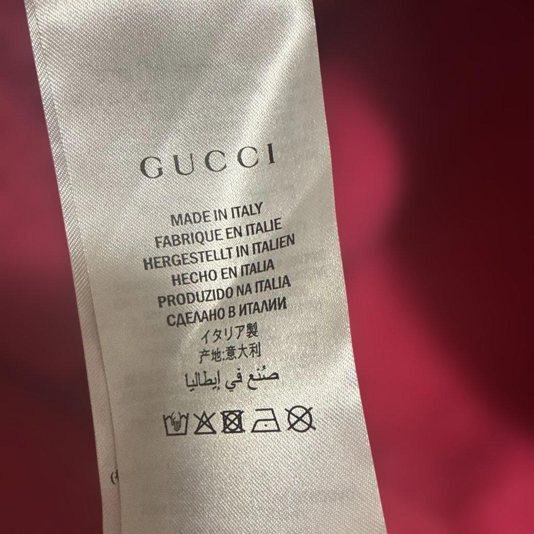GUCCI ピンク スカルプリント パーカー