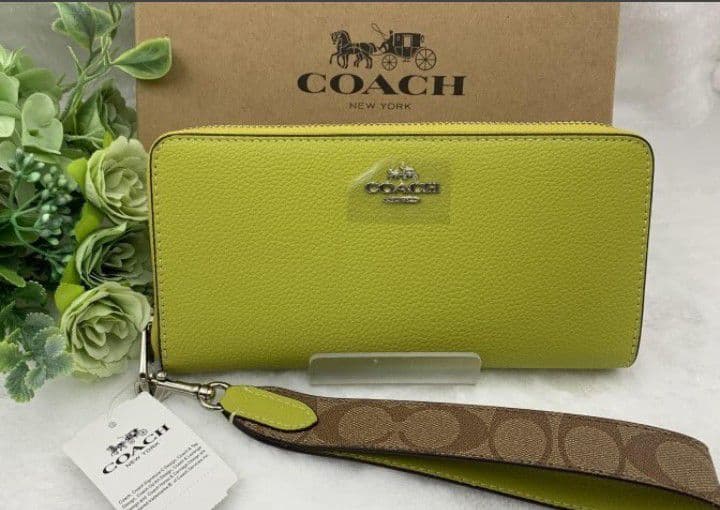 新品未使用コーチ長財布イエローシグネチャーレディースメンズ送料無料即日発送