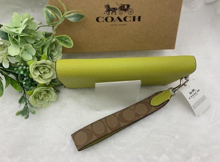 新品未使用コーチ長財布イエローシグネチャーレディースメンズ送料無料即日発送