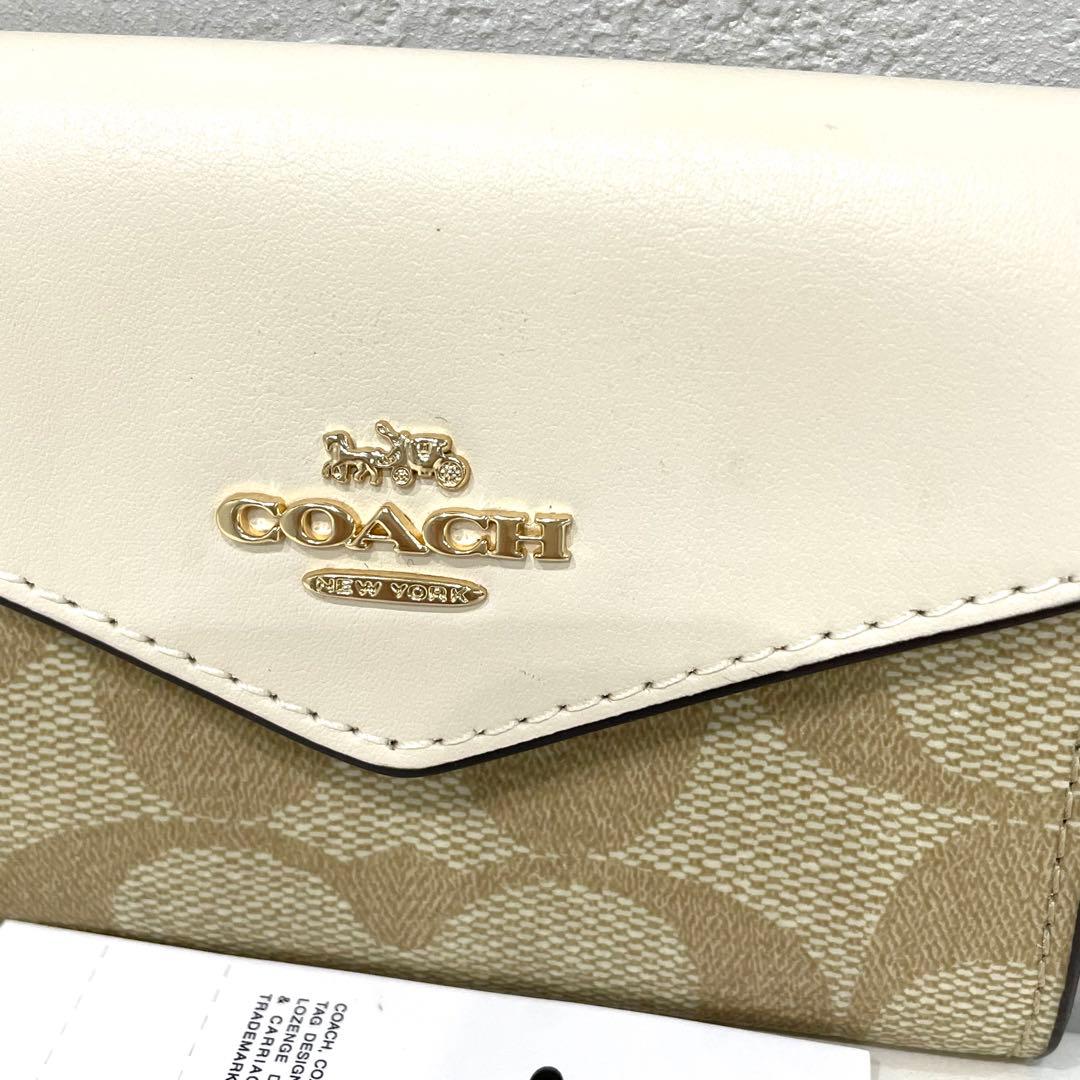 COACH 名刺入れ ベージュ/ホワイト シグネチャー カードケース コーチ