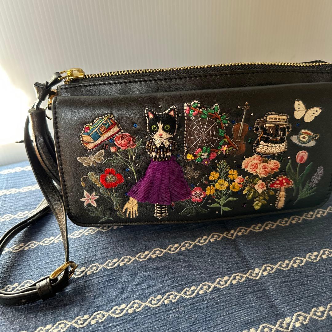 tamaoworldの猫の刺繍レザーポーチ