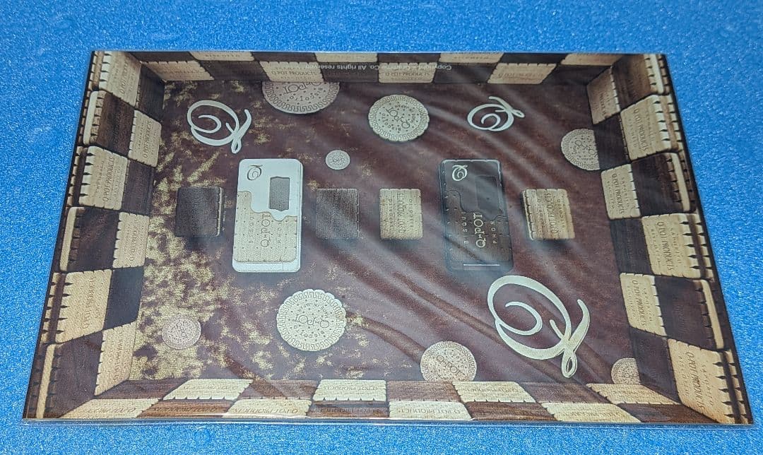 Q-pot. Phone SH-04C docomo チョコレートビスケット