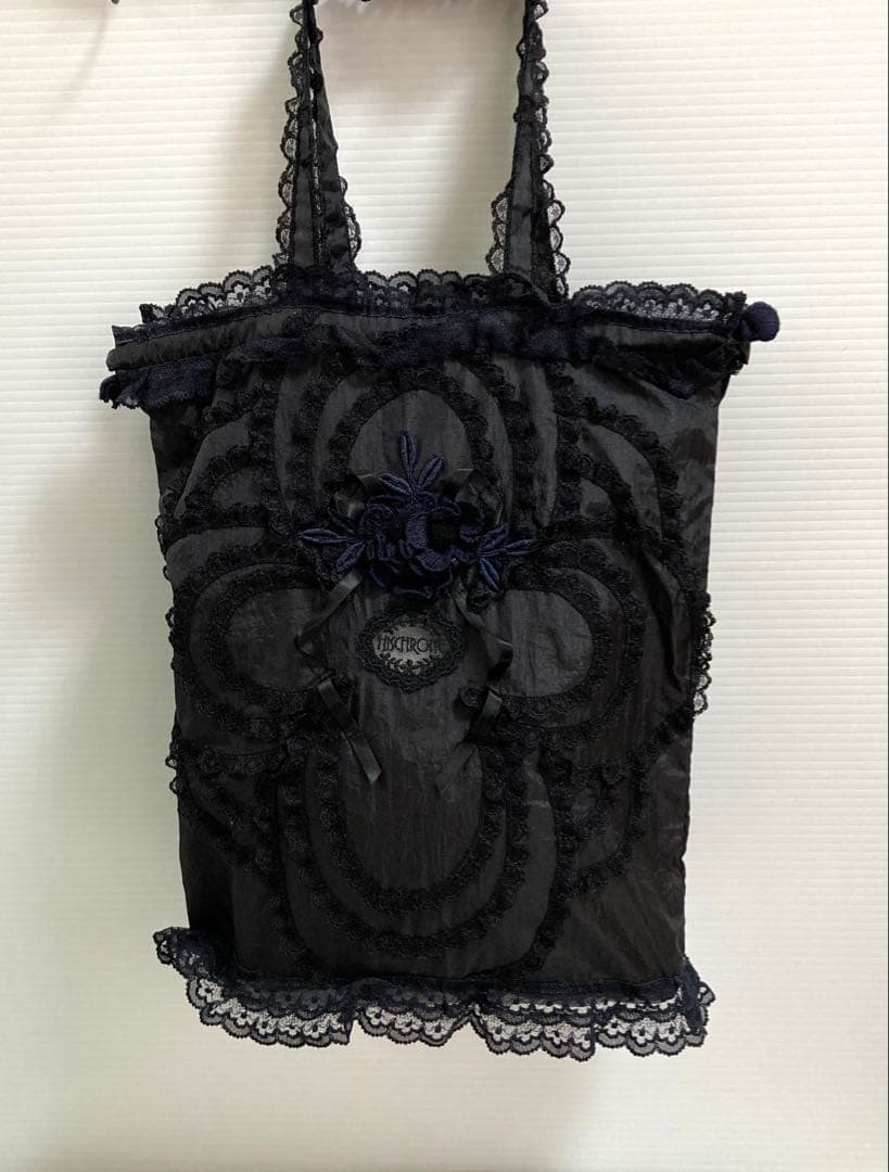 さえら　ヒスクローネ 黒色の手提げ