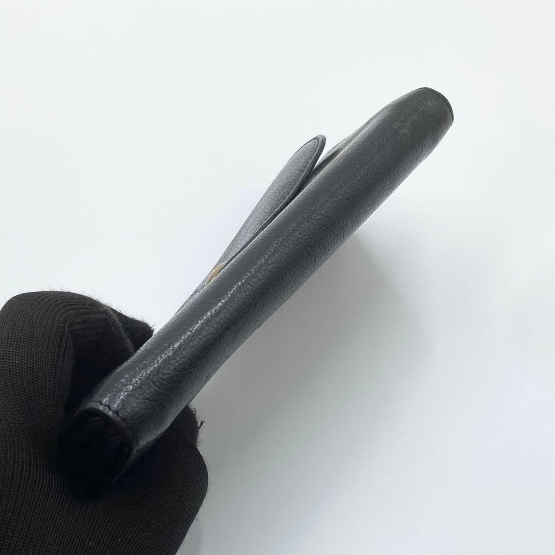 イルビゾンテ　長財布　フラップ　ロゴ刻印　レザー　ブラック　イタリア製