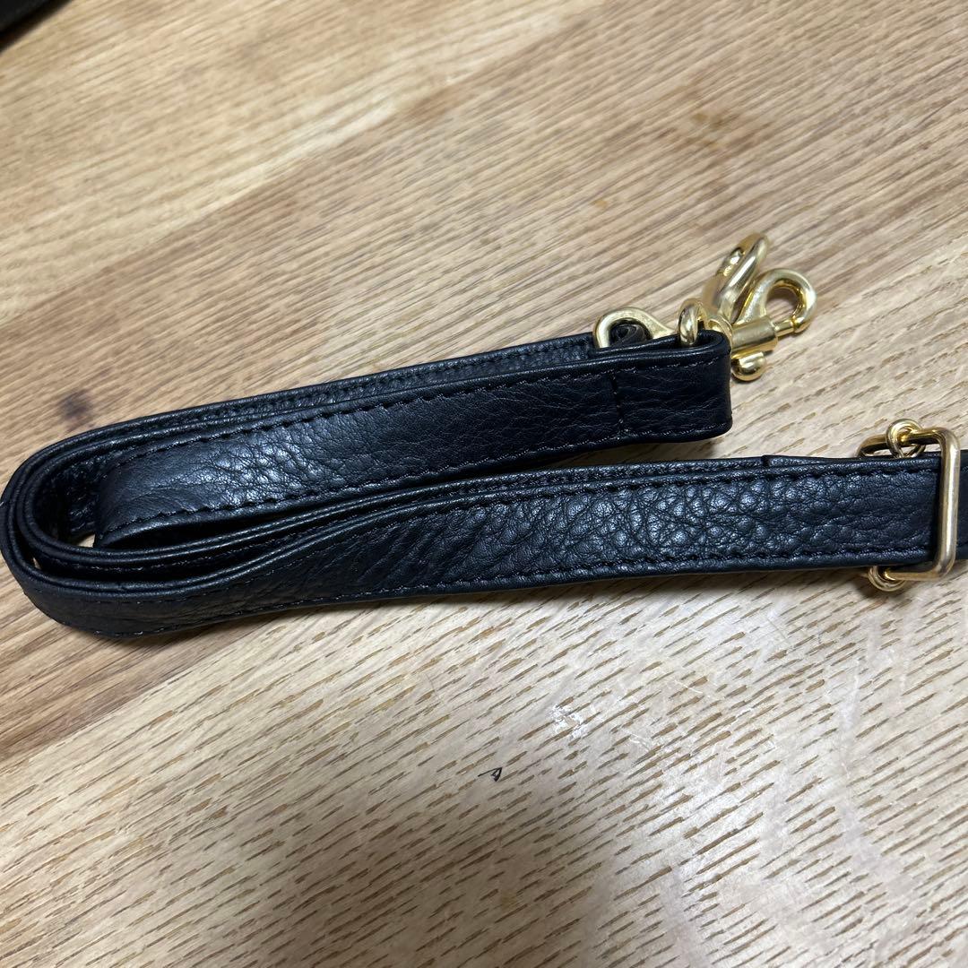 シ*ュ様 新品未使用　POMTATA 牛革　ハンドバッグがま口スコットクラブ系