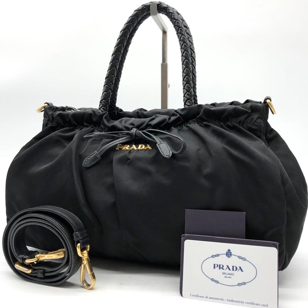 ✨ギャランティ付✨プラダ ハンドバッグ 2way ロゴ金具 リボン ナイロン 黒