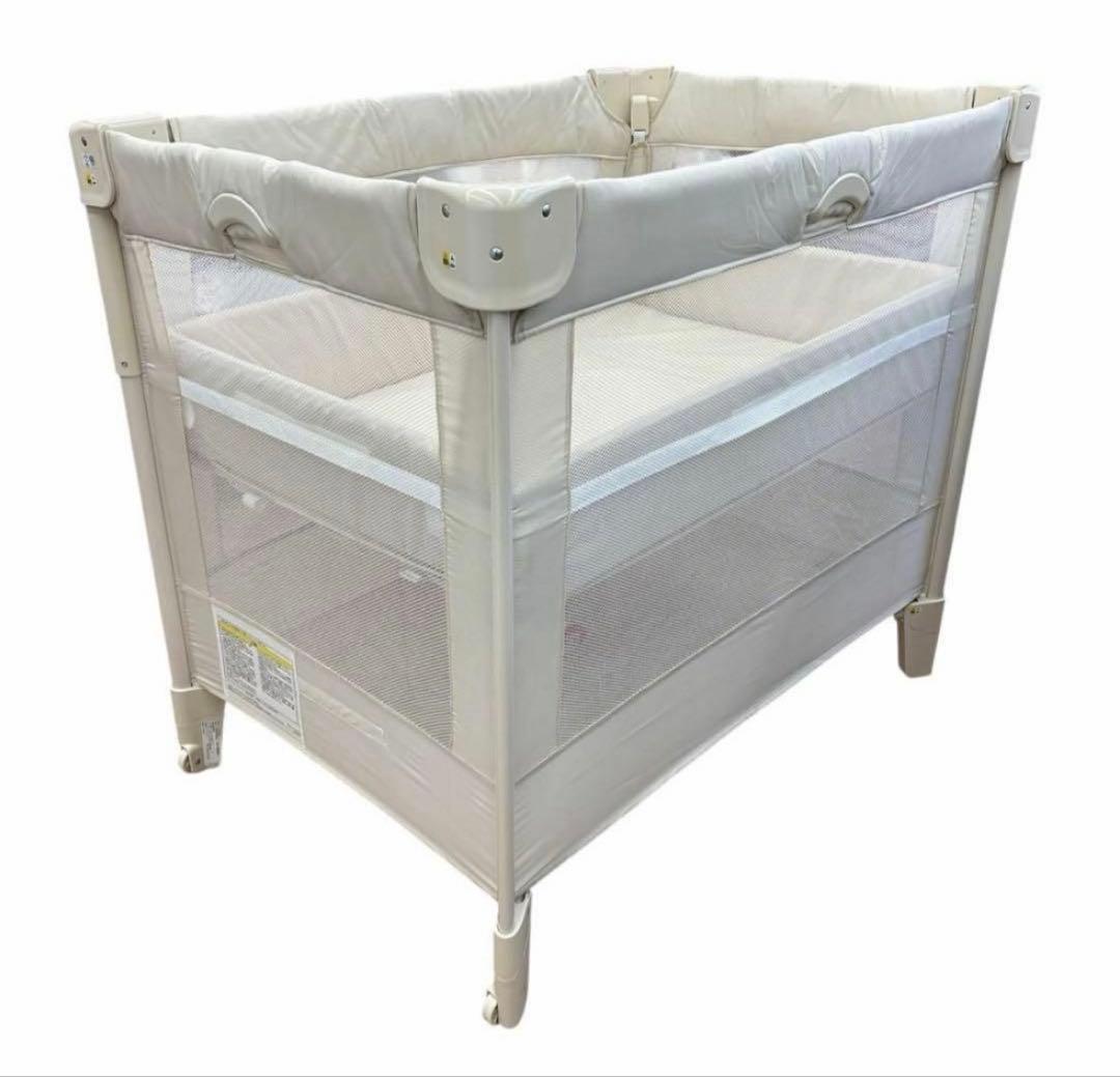 アップリカ　折り畳みベビーベッド ココネルエアー ミルクホワイト