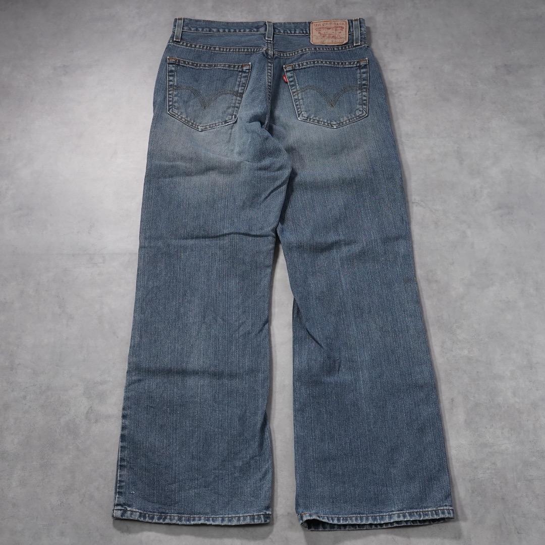 リーバイス567 古着 W32 フレア ブーツ ボトム 青 00s 18707