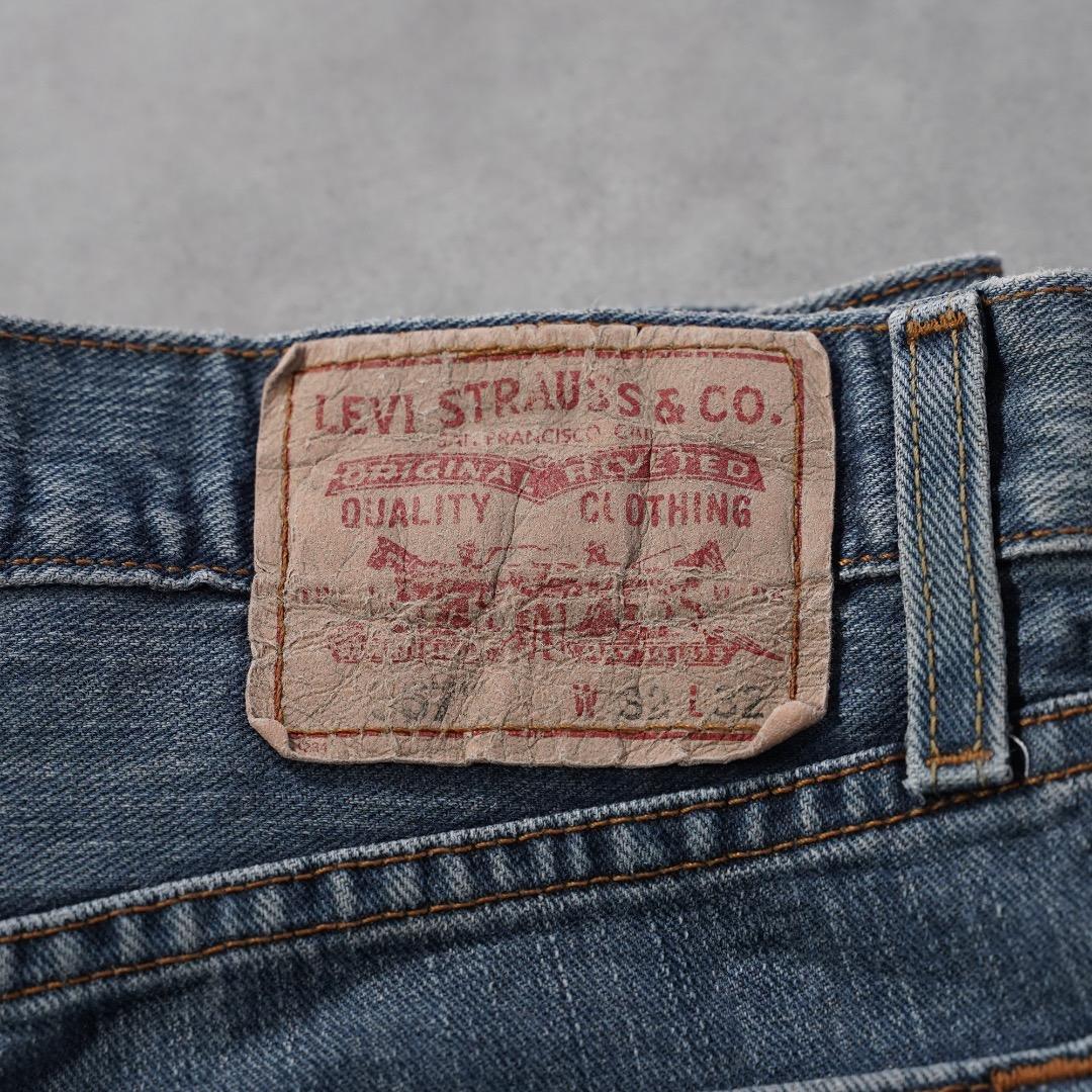 リーバイス567 古着 W32 フレア ブーツ ボトム 青 00s 18707