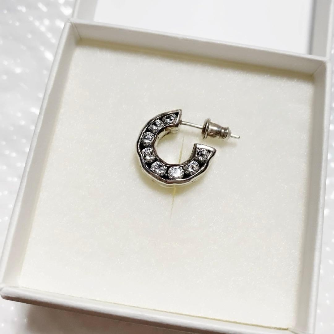 e.m. イーエム ジルコニア埋め込みフープピアス 片耳