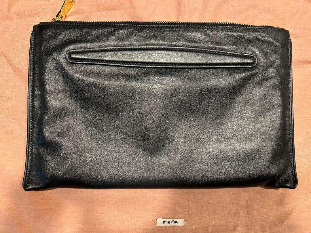 ミュウミュウ　スタッズ　クラッチバック