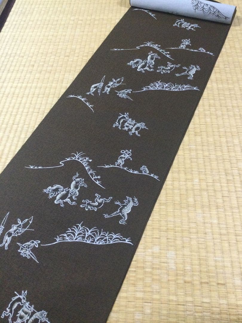 素敵な装い！西陣名古屋帯 綿芯仕立付 「鳥獣人物戯画」茶　簡易包装