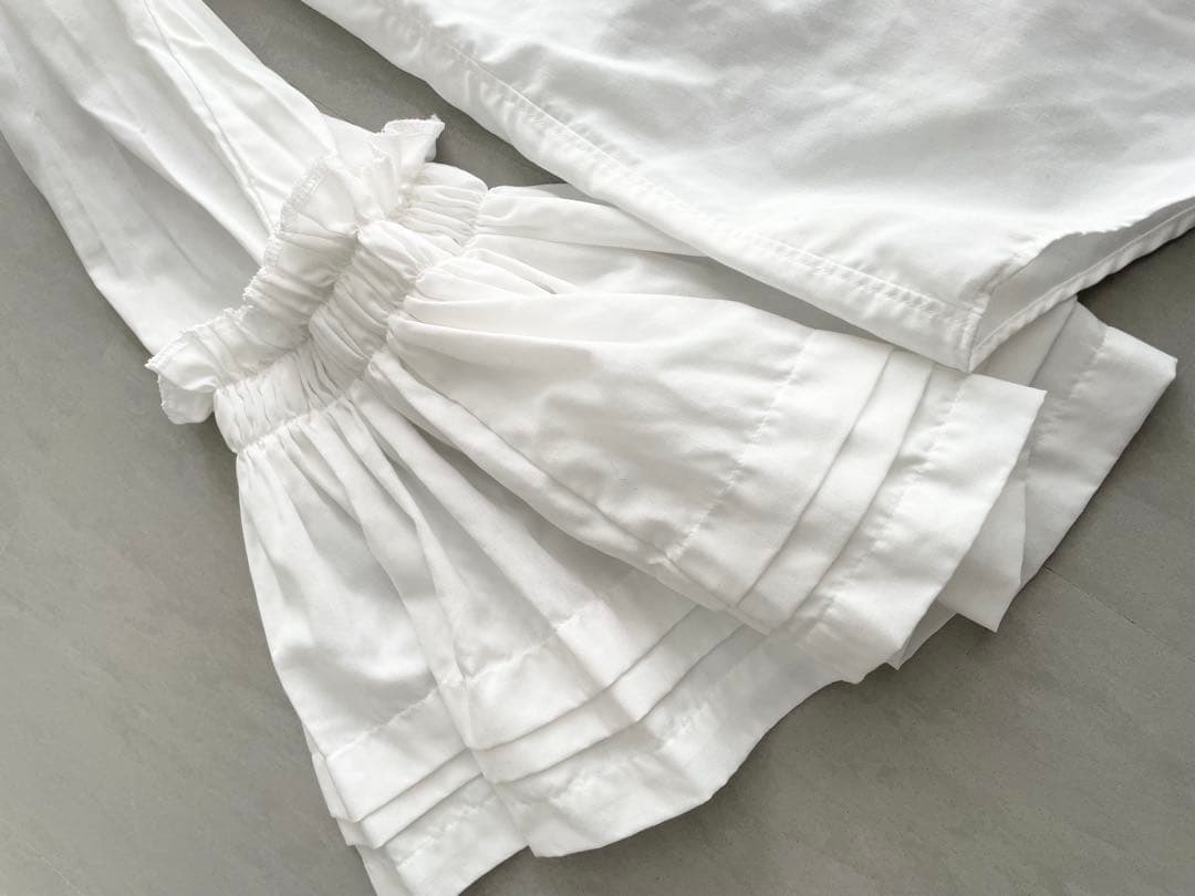 コムコム　フレアシャツ