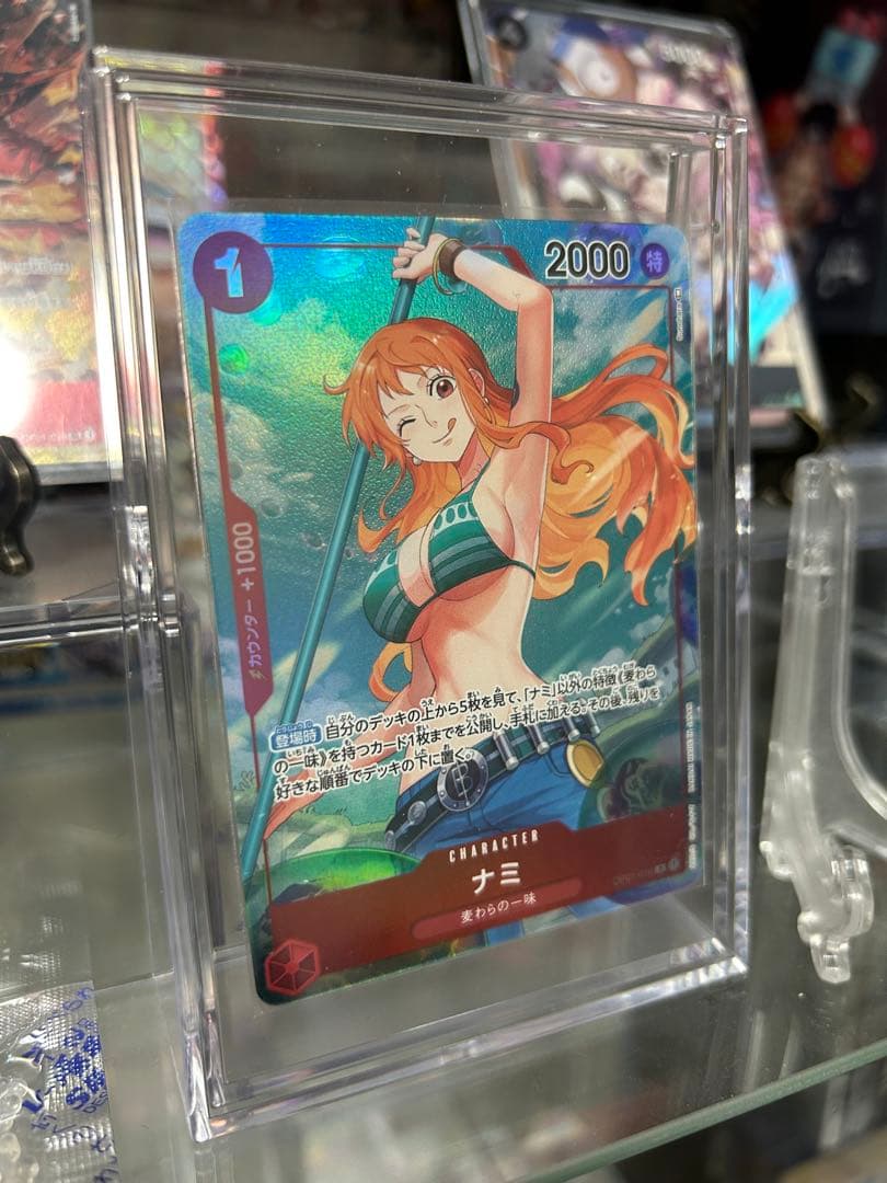 【美品】ワンピースカードナミ R パラレル OP01-016ロマンスドーン