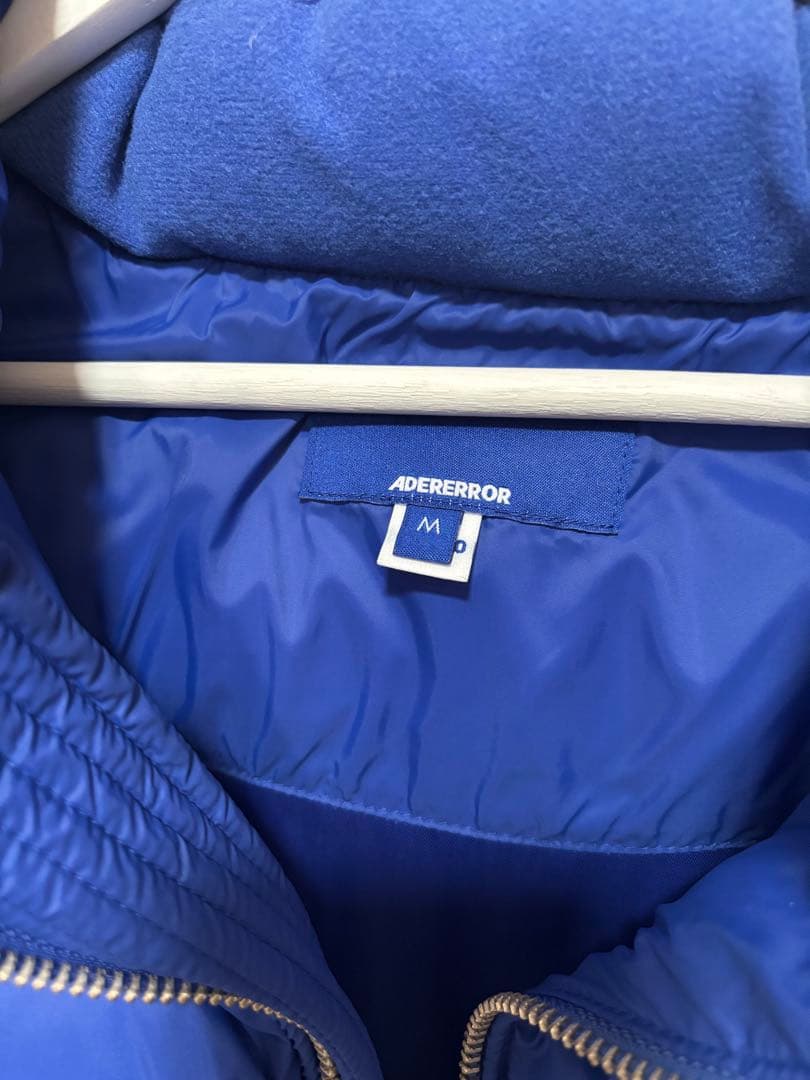 ADER ERROR（アーダーエラー）ダウンベスト M