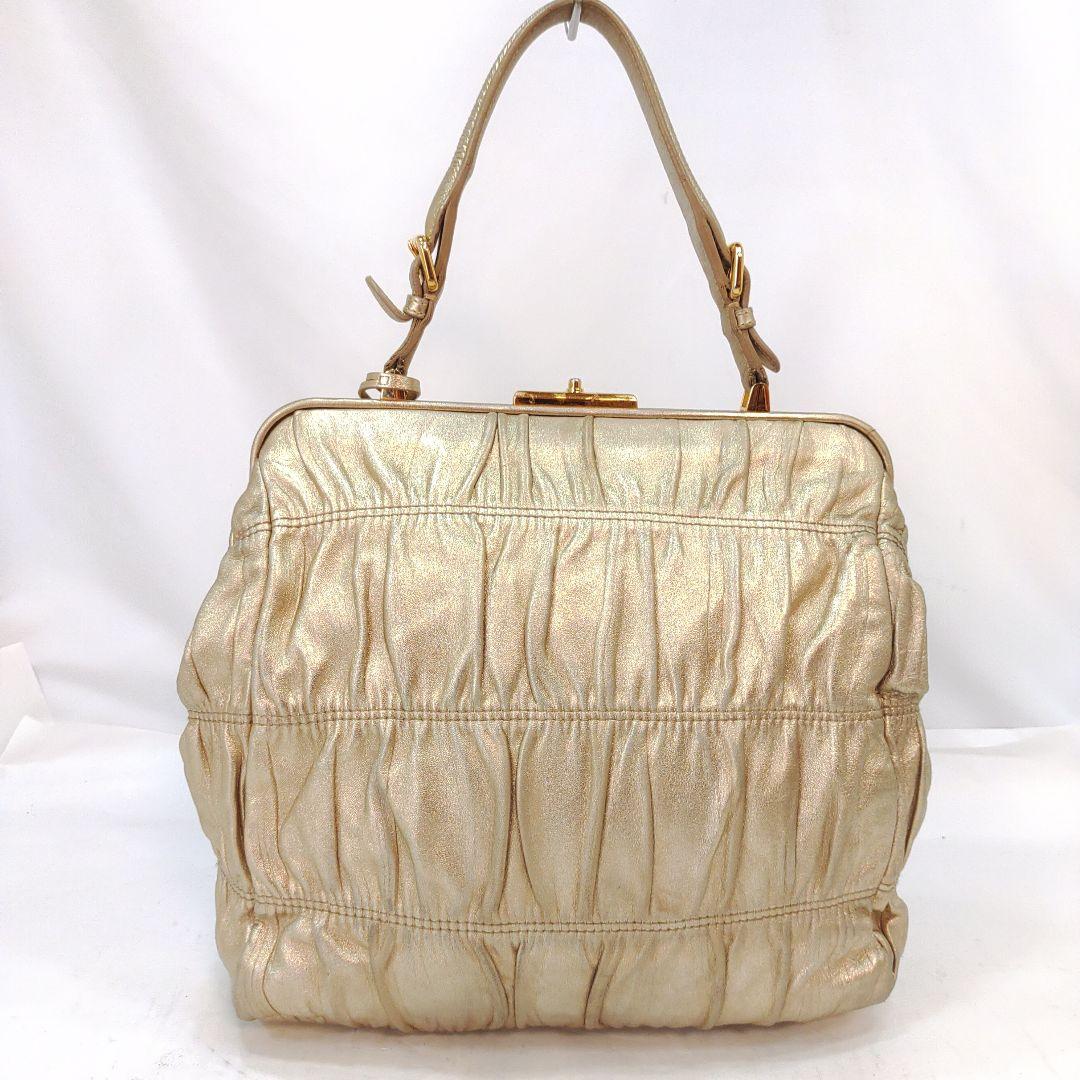 【美品】プラダ ハンドバッグ がま口 ギャザー レザー ギャラ付 ゴールド