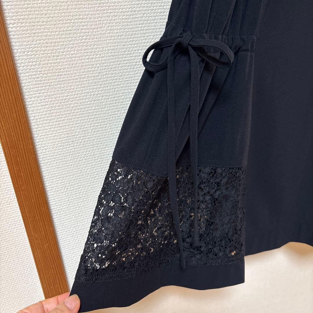 【美品】✨トクコプルミエヴォル✨黒地に野菜の柄で両脇の裾レースのチュニック❣️