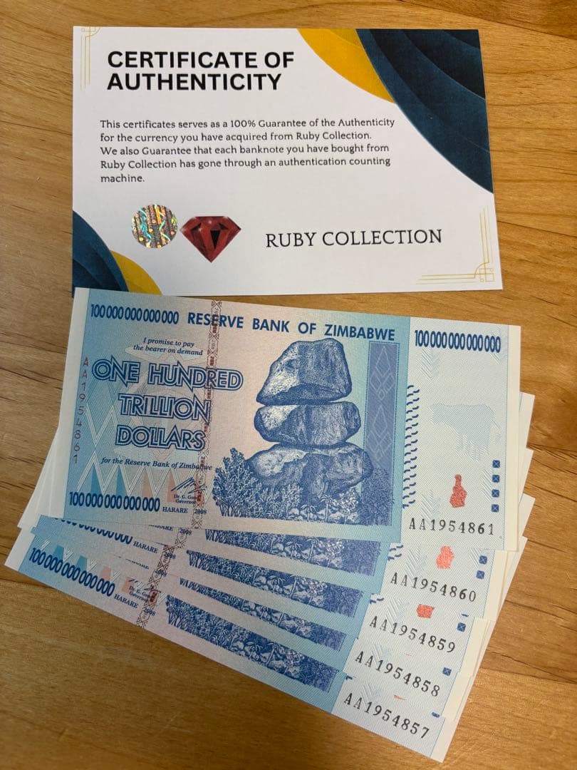 【保証書付き】5 枚連番　ジンバブエ 100兆ドル札 UVチェック済み
