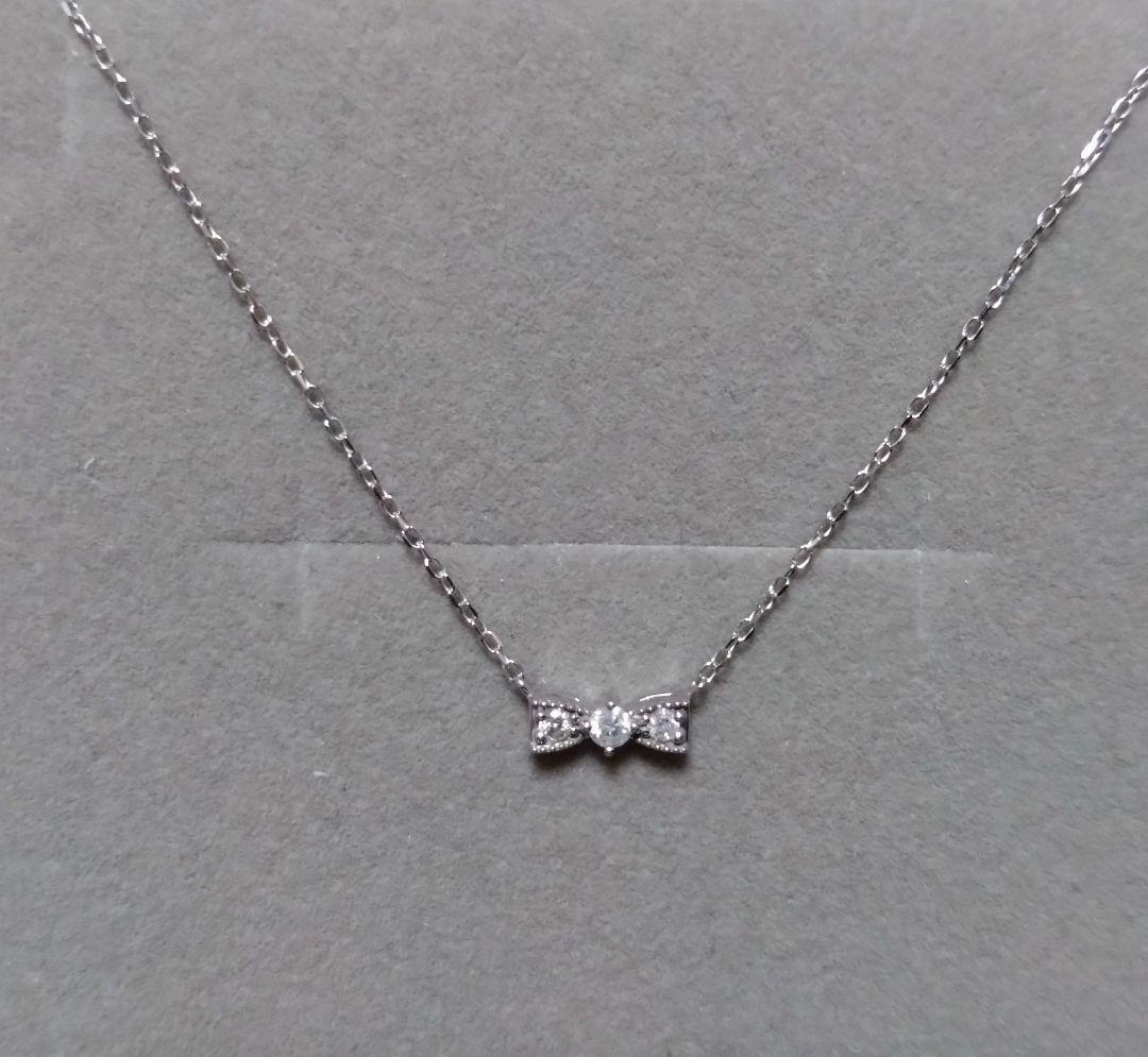 ジュエリーツツミ K10ホワイトゴールドリボン型ネックレス