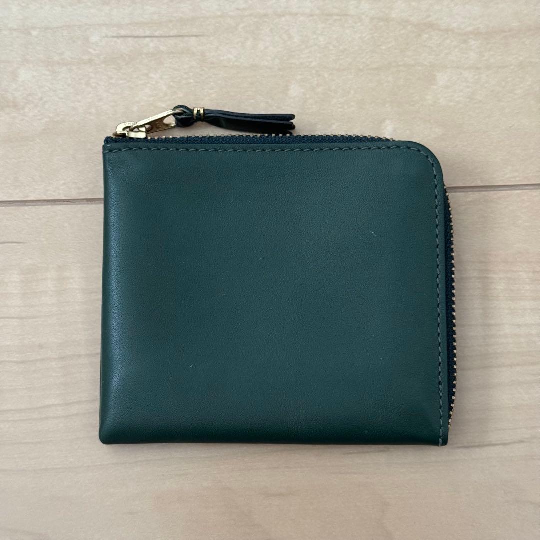 COMME des GARCONS ダークグリーン ケース