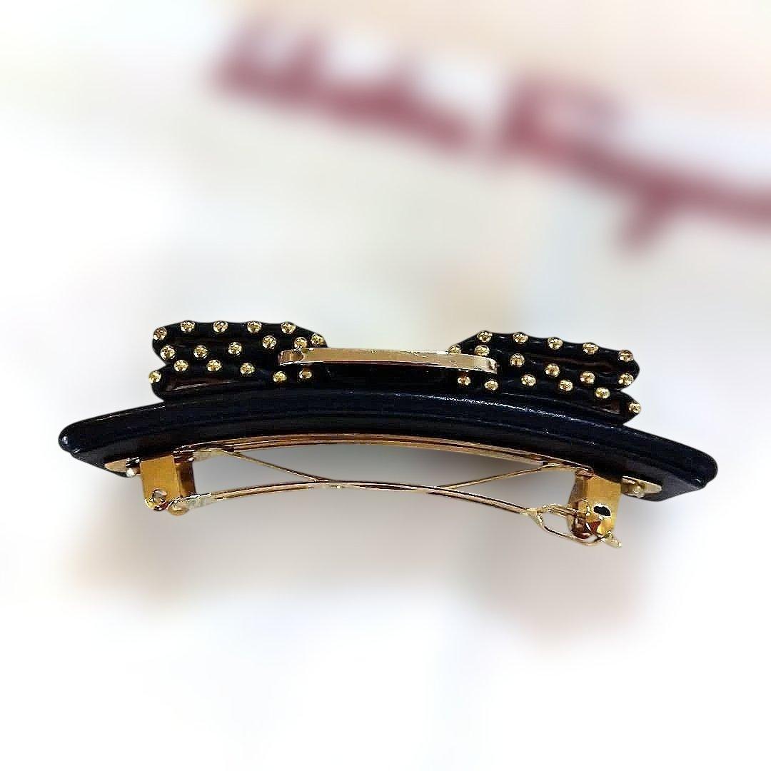 サルバトーレ・フェラガモ　 リボン型ヘアクリップ 黒金