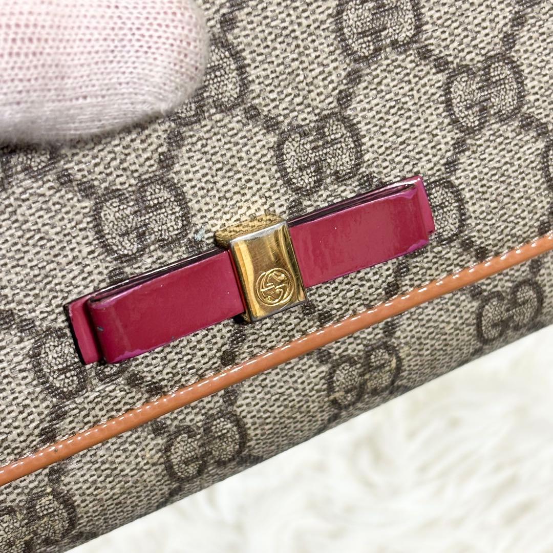 グッチ　長財布　二つ折り財布　リボン　インターロッキング　GGスプリーム　PVC