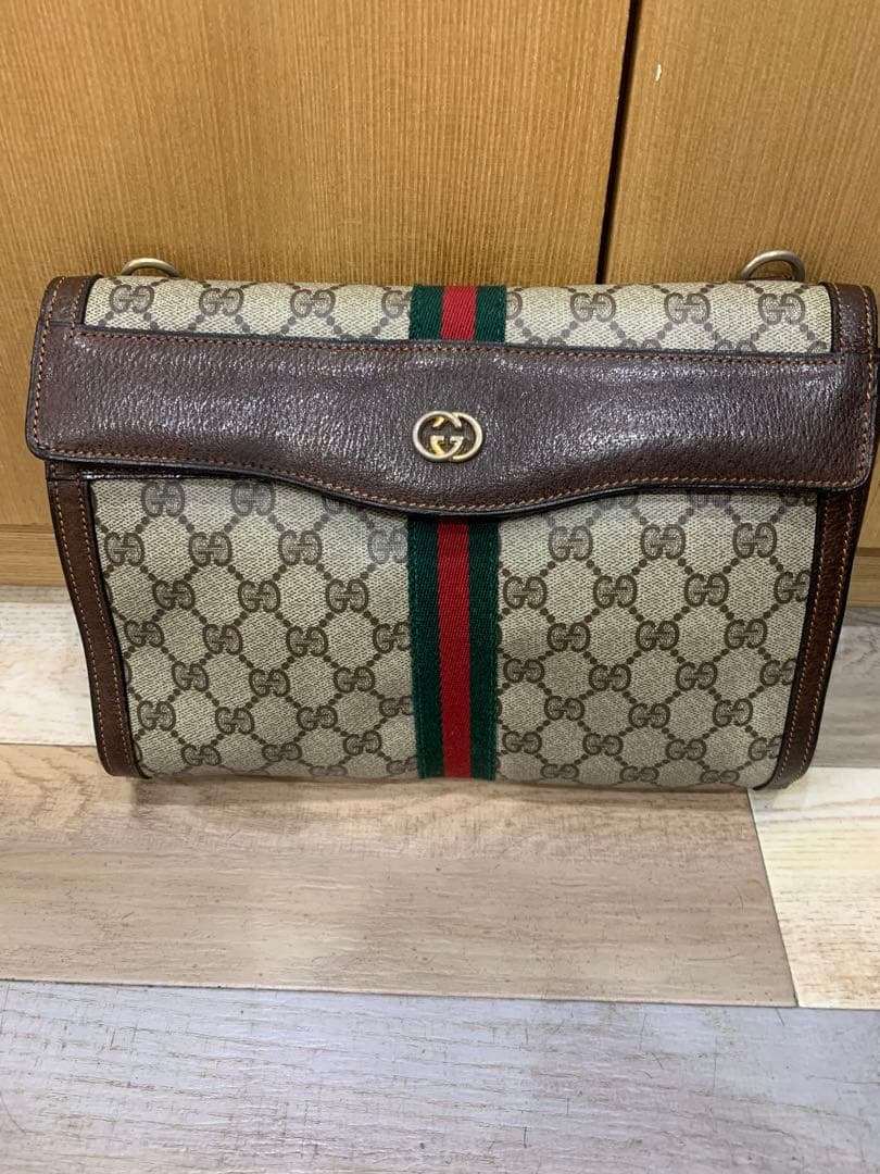 GUCCI GGキャンバス フラップクラッチバッグ
