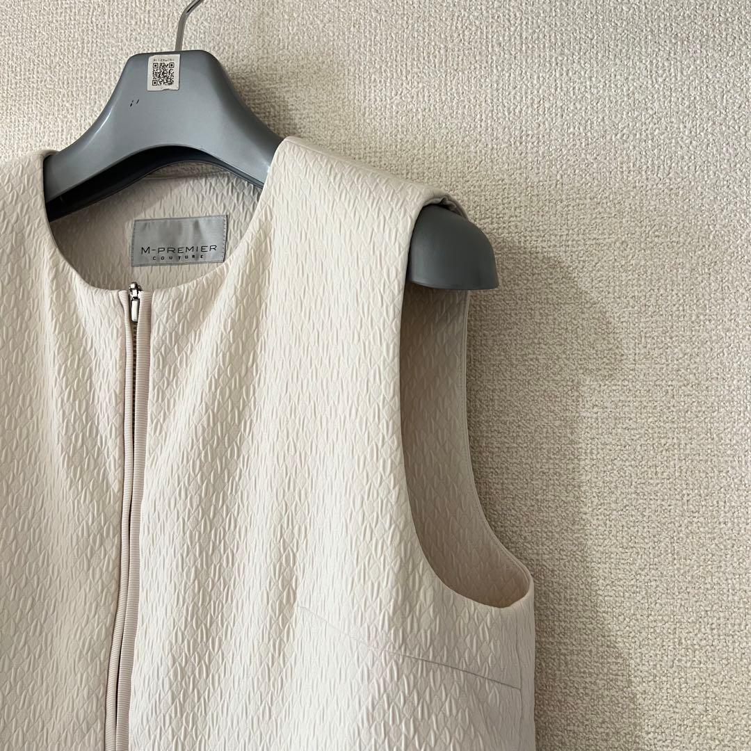 M-PREMIER ダイヤジャガードペプラムダウンベスト